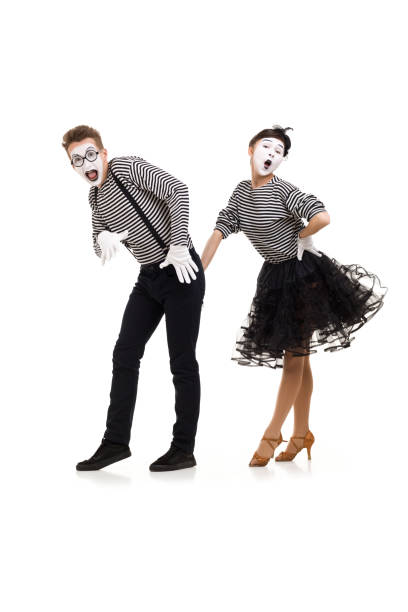 istock Smiling mimes in striped shirts. 1150560033