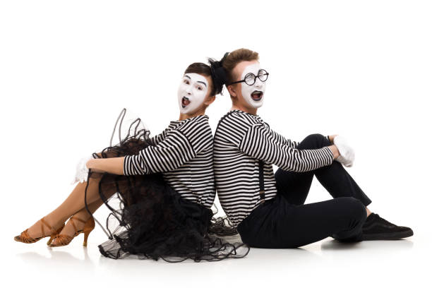istock Smiling mimes in striped shirts. 1150560126
