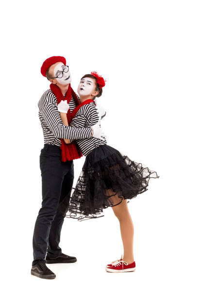istock Smiling mimes in striped shirts. 1150560251