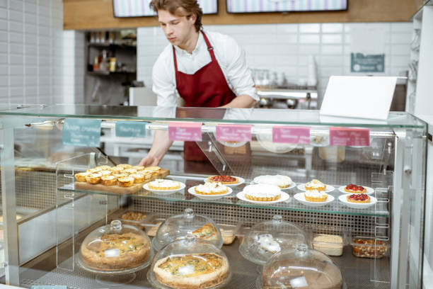 istock Salesman working at the pastry shop 1150560347