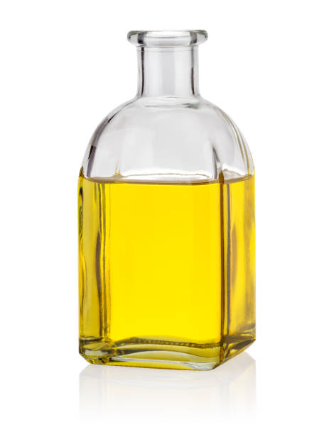 istock Glass bottle with yellow oil 1150567180