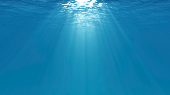 Underwater scene with light rays. 