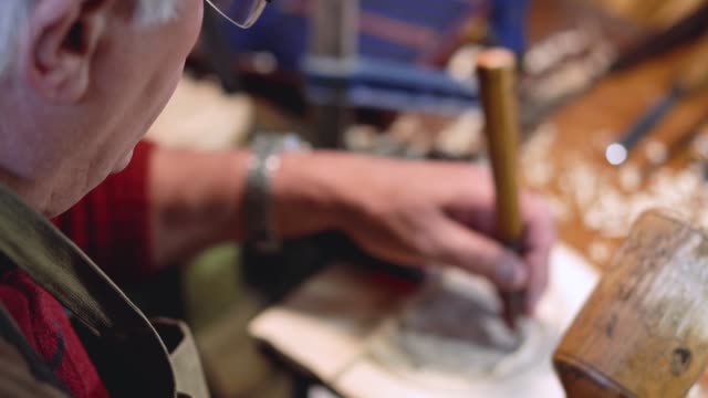 Woodcraft artisan working on decorative object