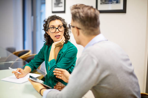 istock Professionals discussing strategy in meeting room 1150572043