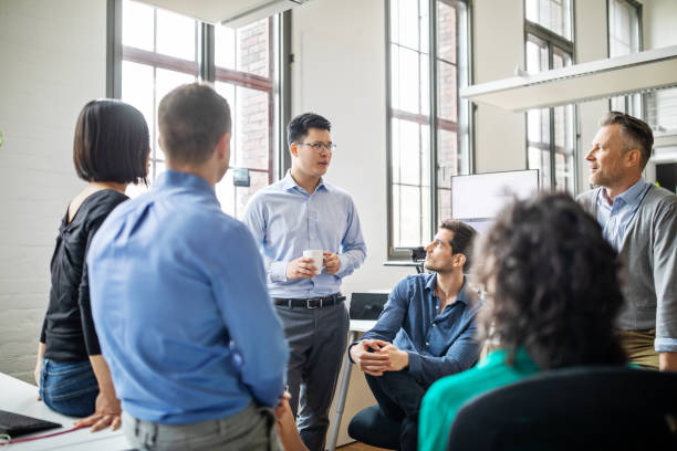 istock Multi-ethnic business colleagues sharing ideas in meeting 1150572090
