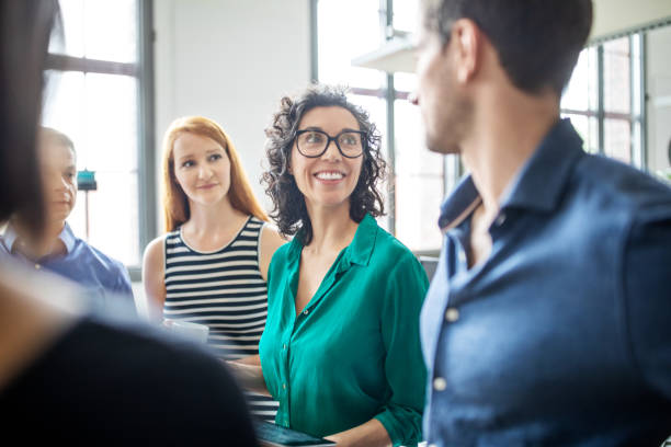 istock Multiracial business people having meeting in office 1150572101