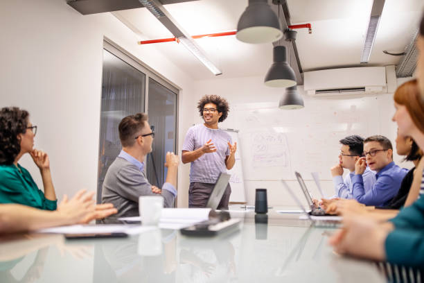 istock Businessman giving presentation in office 1150572147