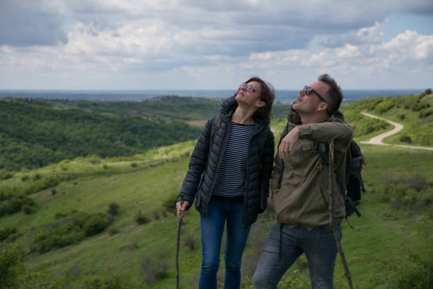 istock Couple hiking on a mountain 1150573851
