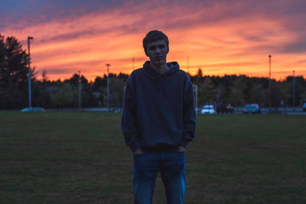 istock Lonely teenager at sunset. 1150574718