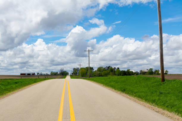 istock Open road through the countryside 1150578555