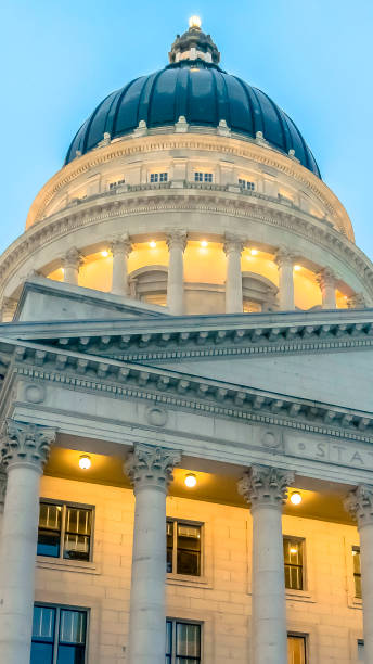istock Vertical The magnificent Utah State Capital Building with cloudy blue sky background 1150579062