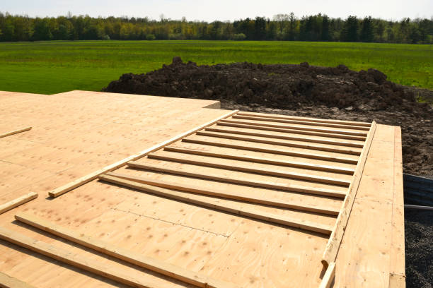 istock New Home Under Construction with Lumber Framing and Carpentry Builders Craftsman 1150580193