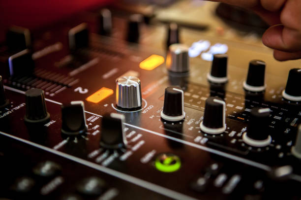 istock Close up of DJ hands mixing music on a table. 1150581320