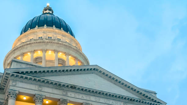 istock Clear Panorama The magnificent Utah State Capital Building with cloudy blue sky background 1150582203