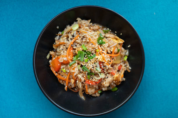 istock Plate with asian food, blue background 1150587106