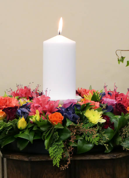istock Flower and candle used for a funeral 1150588451