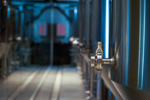 Craft beer production in private brewery. Beer Preparation Brewery Equipment, close-up.