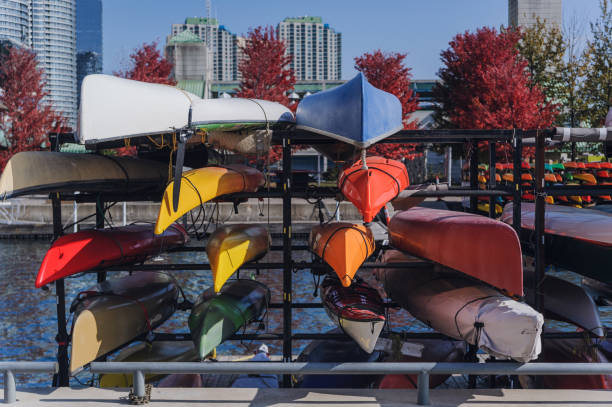 istock Brightly colored kayaks and canoes 1150592197