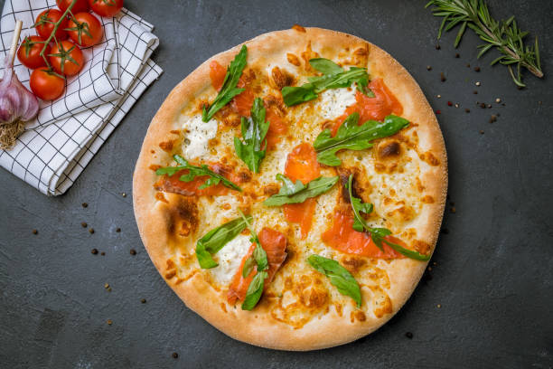 Pizza with salmon and Philadelphia cheese