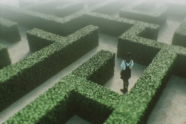istock Woman lost in park maze 1150593211