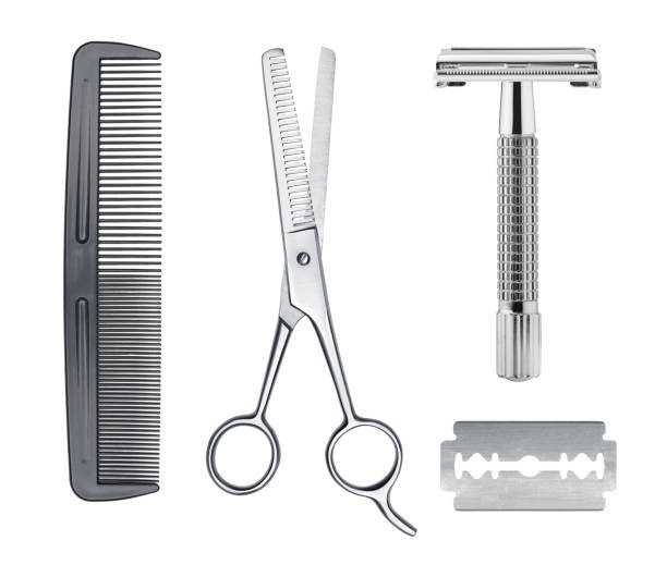 Comb, razor and scissors isolated on white background