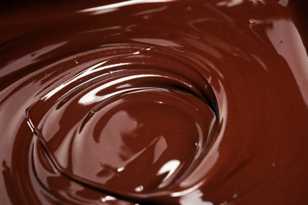 istock Melting chocolate, melted delicious chocolate for handmade praline icing confectionery 1150595336