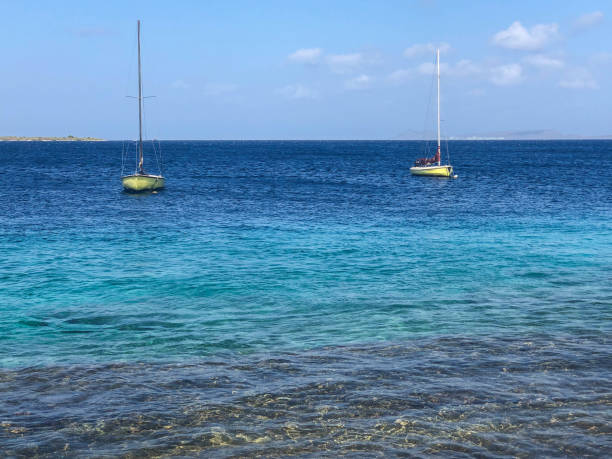 istock Boats sit on the coastline in Bonaire 1150597496