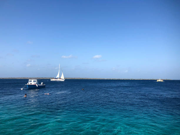 istock Boats sit on the coastline in Bonaire 1150598030