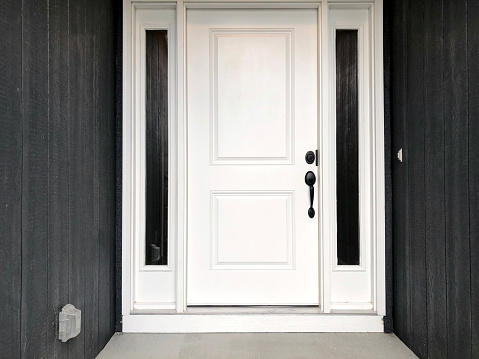 white front door black siding