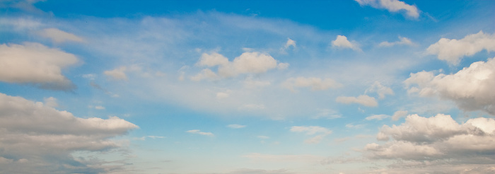 Cirrus clouds appear in a blue sky over Puget Sound at the Nisqually National Wildlife Refuge near Olympia, Washington State, USA.