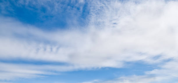 Cirrus Clouds in a Blue Sky Cirrus clouds appear in a blue sky over Cowiche Canyon near Yakima, Washington State, USA. jeff goulden panoramic stock pictures, royalty-free photos & images
