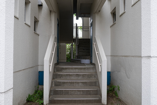 A staircase of an apartment building