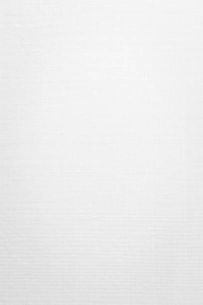 istock Cotton silk blended fabric wallpaper texture pattern background in pastel white color tone 1150607463