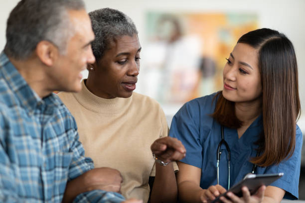 istock Sharing results with an elderly couple 1150608052