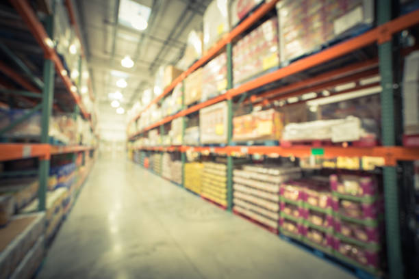istock Filtered image blurry background big boxes wholesale store in America 1150628479