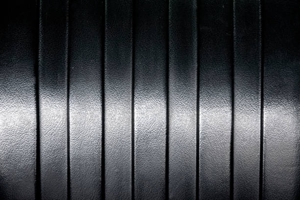 istock Black metal texture and gradients shadow. 1150631015