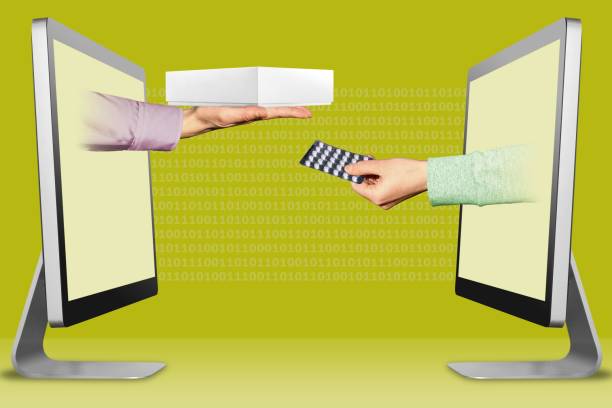 istock electronic concept, two hands from displays. hand with white tablet computer box and hand with medicine pills . 3d illustration 1150633539