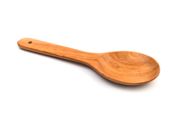 wooden spoon isolated on white background. - old fashioned domestic kitchen old close up imagens e fotografias de stock