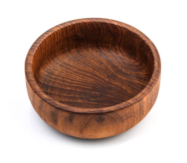 istock Wooden bowl isolated on white background. 1150640778