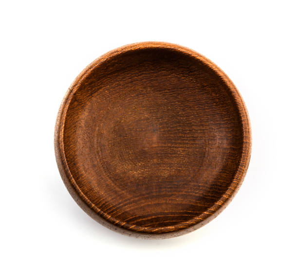 istock Wooden bowl isolated on white background. 1150641349