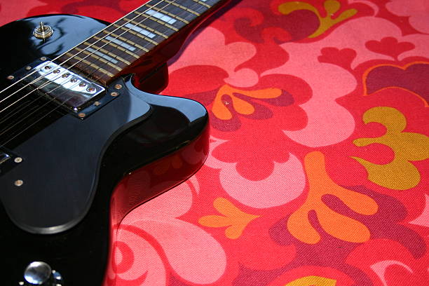 black guitar on retro stock photo