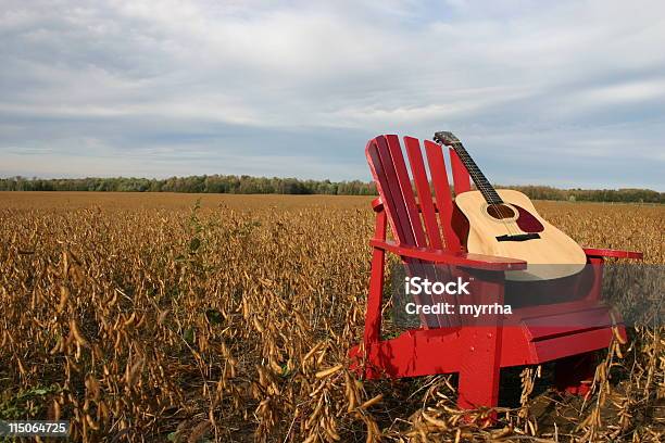 Guitar On Red Chair Stock Photo - Download Image Now - Agricultural Field, Alternative Therapy, Chair