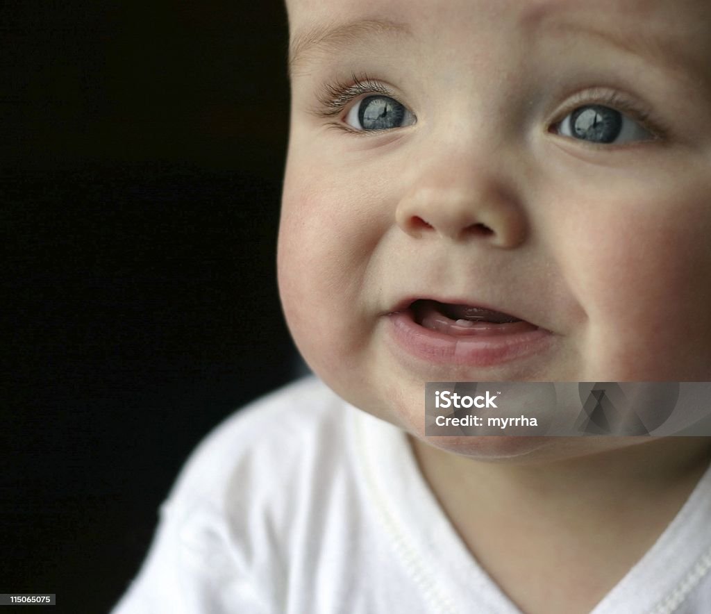 Les premiers pas de bébé dents - Photo de Affectueux libre de droits