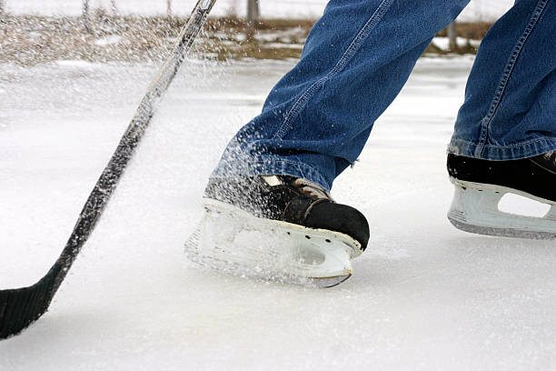 istock Pond Hockey; skate spray 115065156