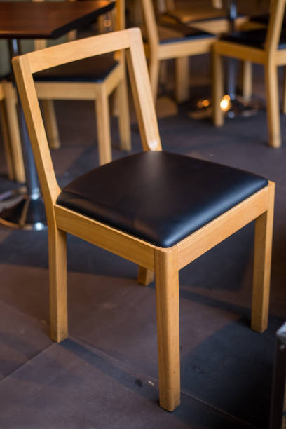istock wooden chairs in cafe 1150656102