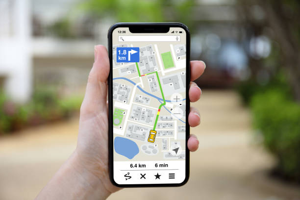 istock female hand holding phone with app navigation map on screen 1150658514