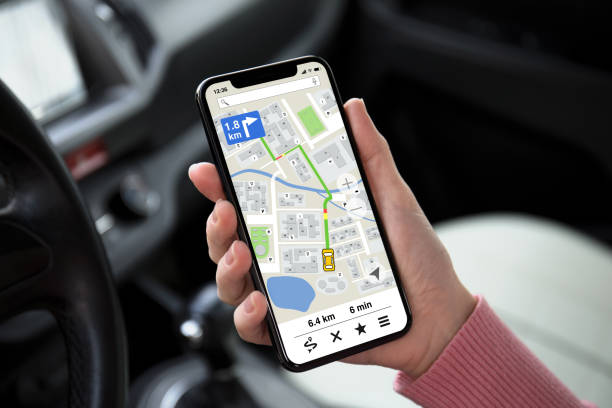 istock women hand holding phone with app navigation map on screen 1150659163