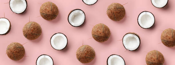 Coconut pattern on pastel pink background. Summer concept. Flat lay, top view