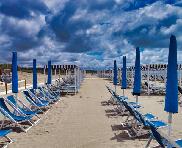 picturesque view on italian sandy beach marina di vecchiano nearby pisa, tuscany  italy - marina di pisa imagens e fotografias de stock