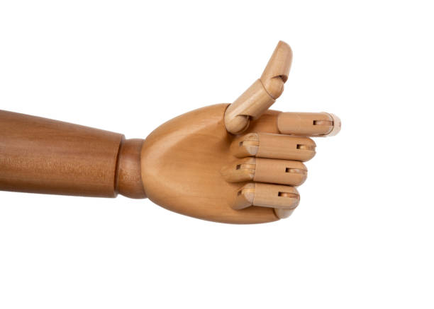 istock Wooden hand isolated on a white background 1150661501